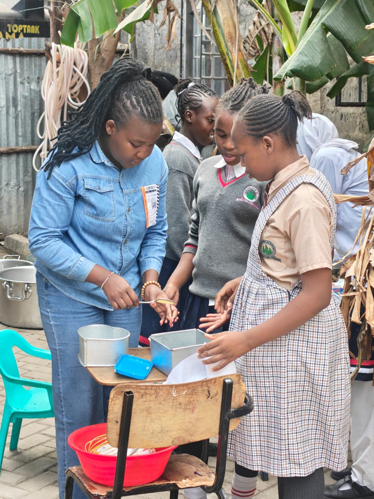 A chef demonstrating to learners on career day