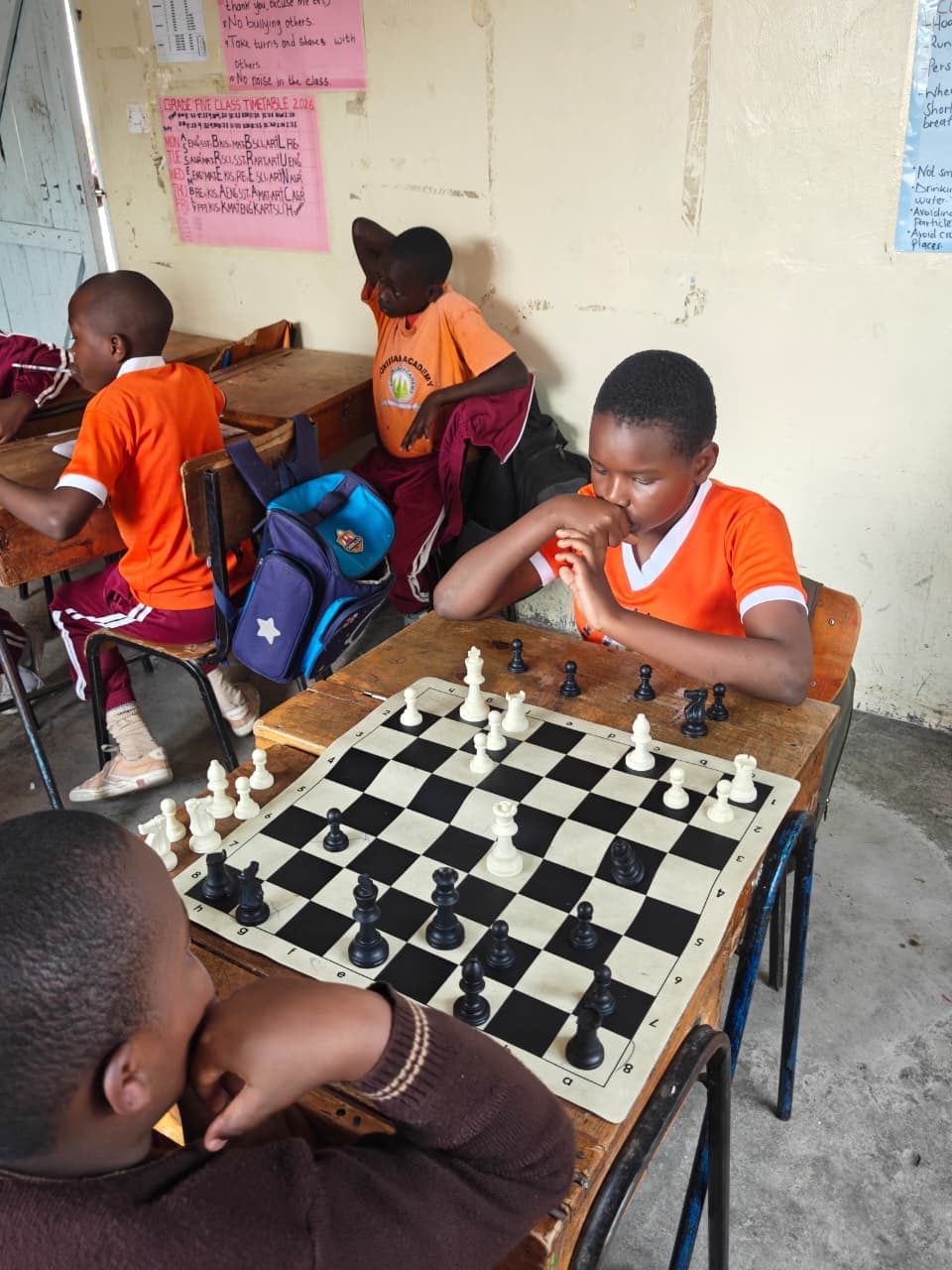 Learners playing chess
